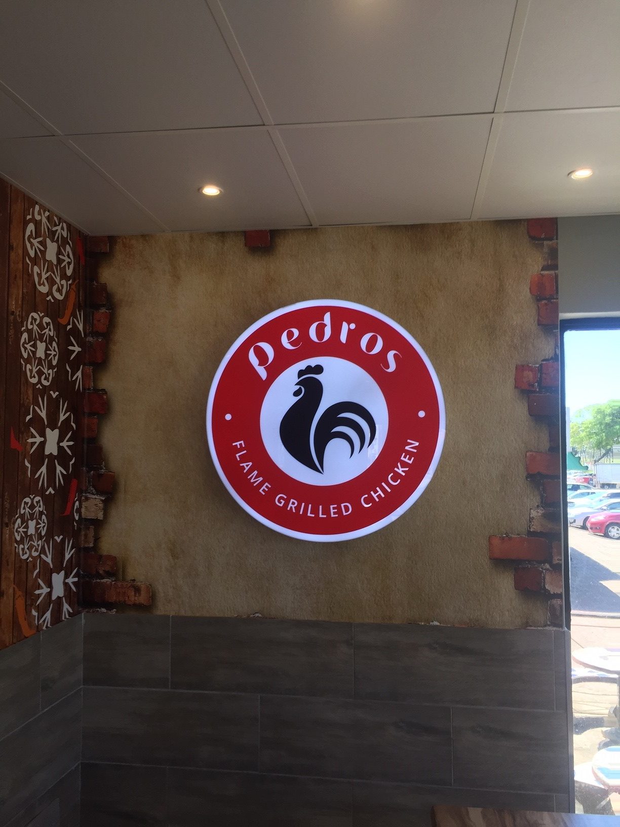 Craftsman working on custom sign